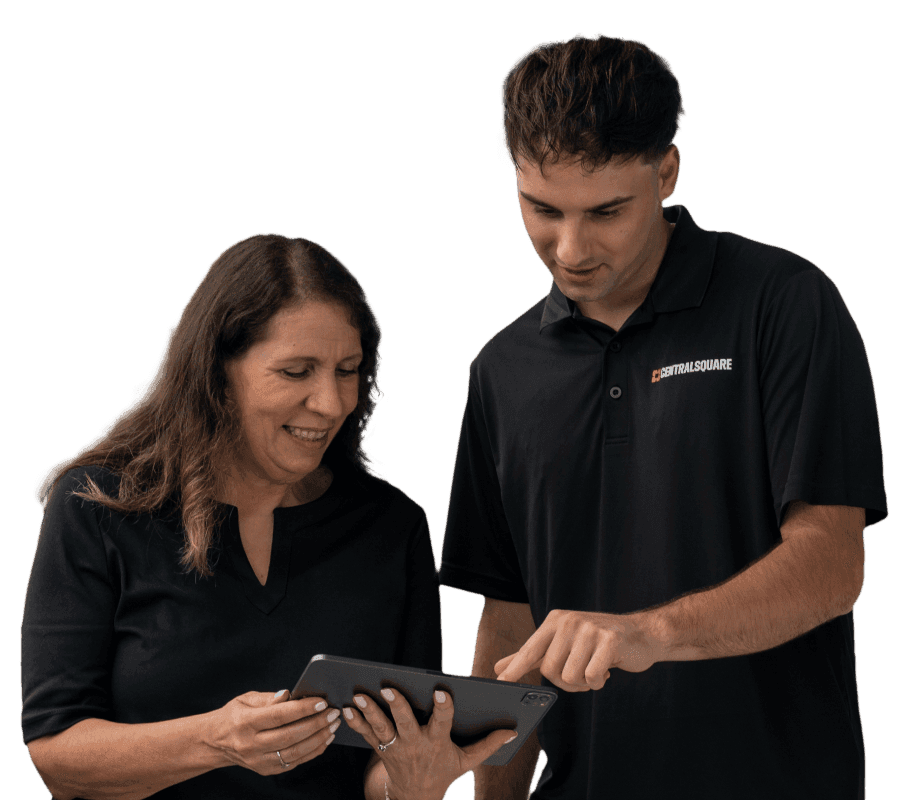 A centralsquare employee and customer looking at a tablet together